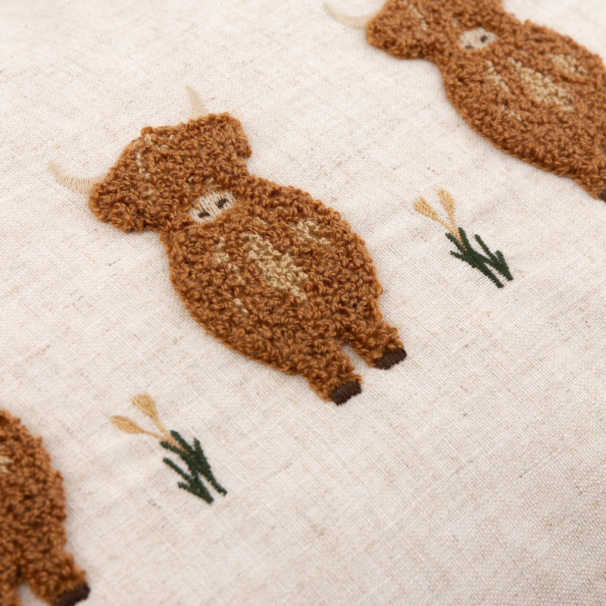 Ramble Highland Cow Tufted Cushion from Wylder