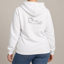 Floating Otter Adult Hoodie - Wild Lines lead image