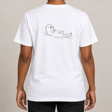 Floating Otter Adult Unisex T-shirt from the Wild Lines Range lead image